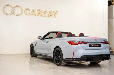AED 4527 PM | BMW M4 COMPETITION CABRIOLET Xdr2024 | WELL MAINTAINED | 1 YEAR WARRANTY-1