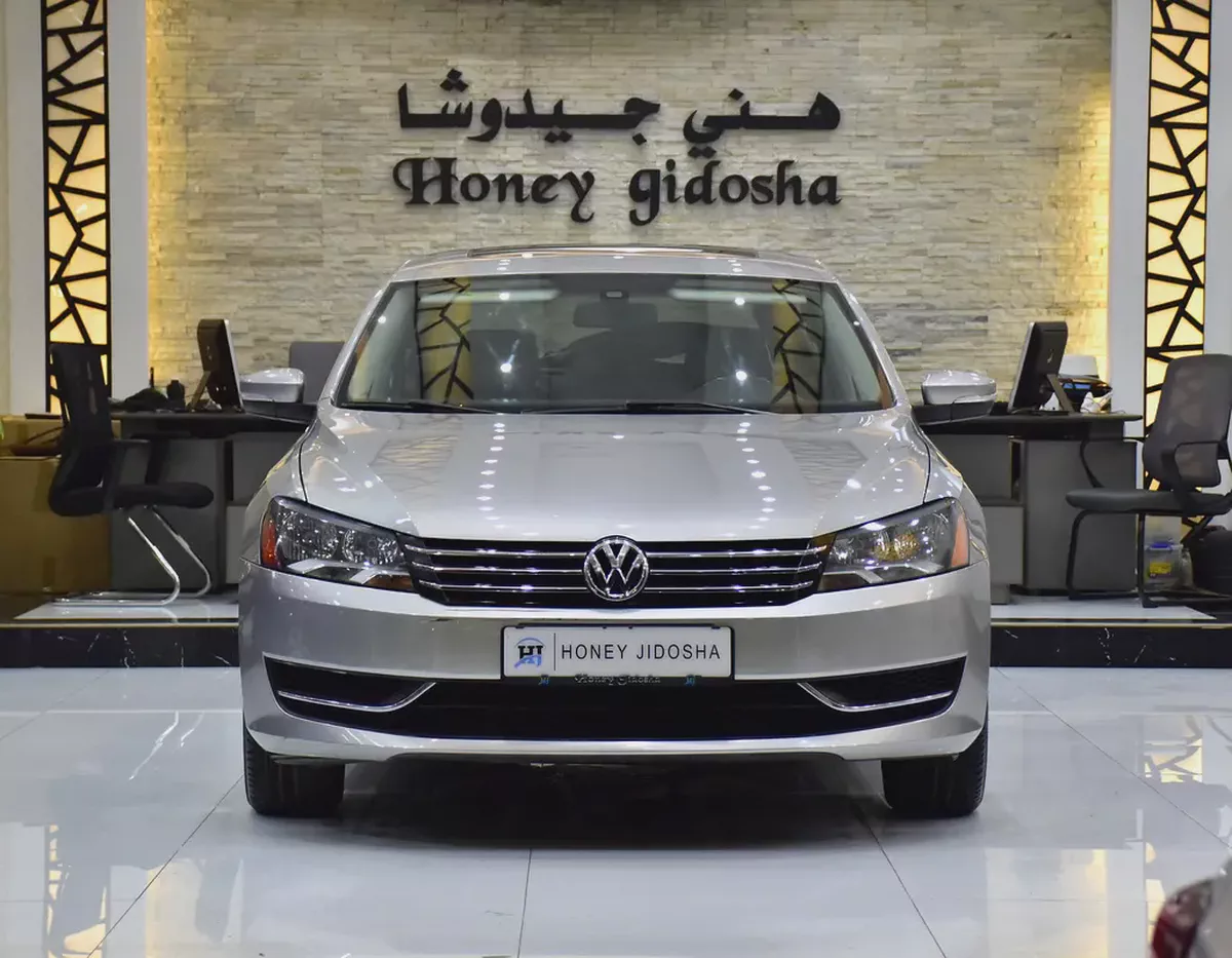 EXCELLENT DEAL for our Volkswagen Passat ( 2013 Model ) in Silver Color Canadian Specs
