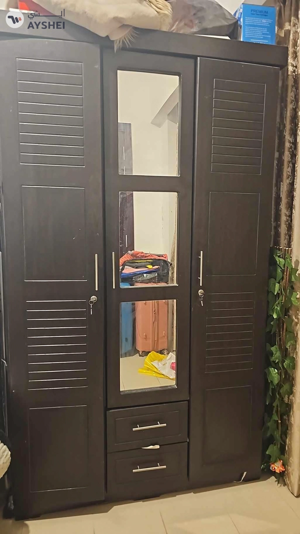 three door cupboard