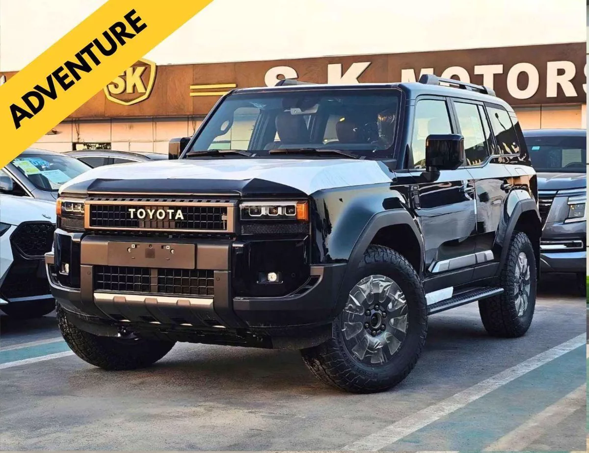 Toyota Prado  ADVENTURE TURBO || 2.8L V4 DIESEL / DRIVER PWR SEAT WITH LEATHER / DVD+CAMERA / COOL BOX (CODE # PDA