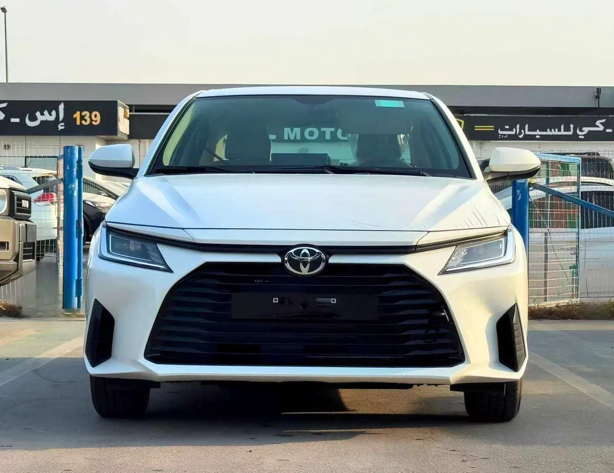 Toyota Yaris E  STANDRAD OPTION || 1.5L PETROL V4 | FABRIC SEATS | DVD | REAR PARKING SENSOR (CODE # YREO)
