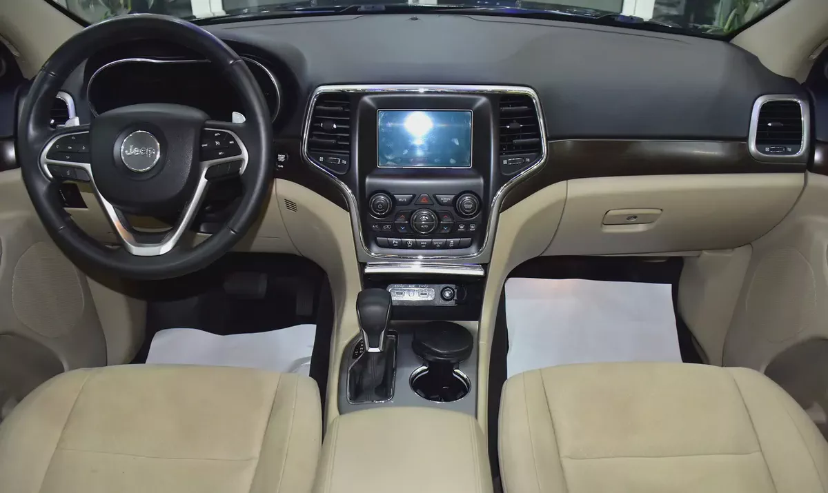 EXCELLENT DEAL for our Jeep Grand Cherokee Laredo 4x4 ( 2018 Model ) in Black Color GCC Specs-10-10