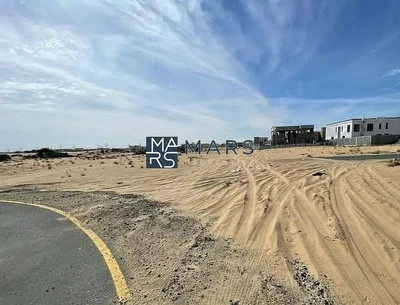 Invest today in Juwaiza – 3,140 sq. ft. on a main road.-0