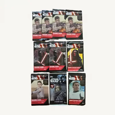 A collectible lot of 10 sealed Topps Star Wars trading card packs-0