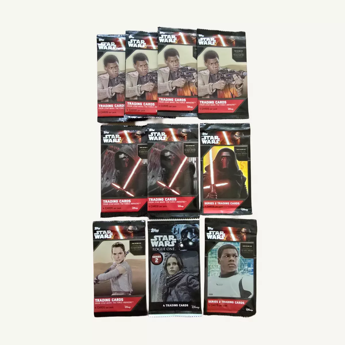 A collectible lot of 10 sealed Topps Star Wars trading card packs-0-0