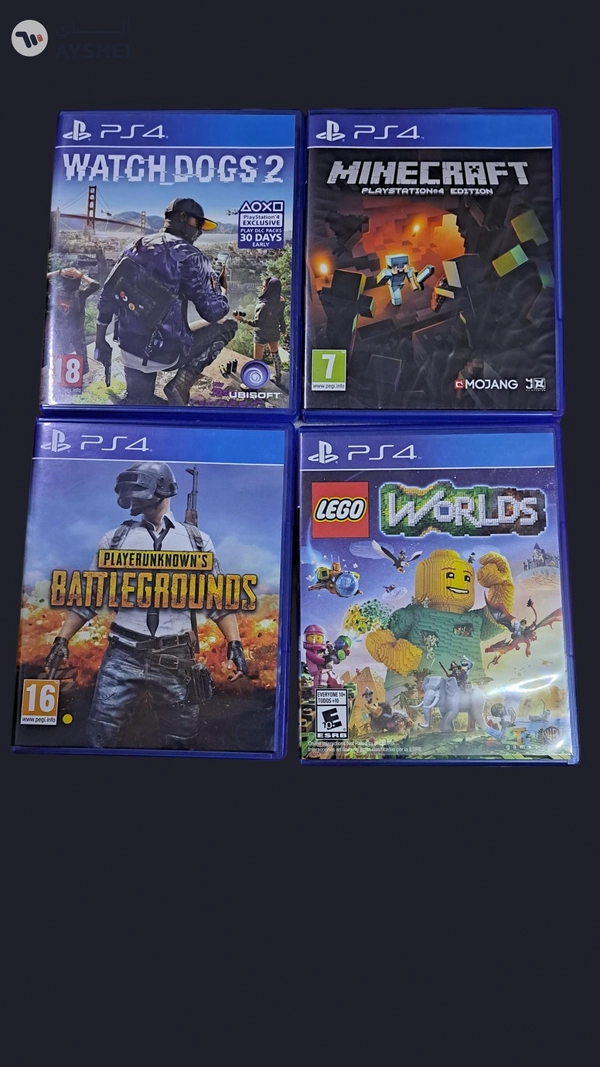 PS4 CONSOLE WITH CONTROLLERS AND CDS