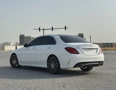 Mercedes-Benz C200 AMG Line | 2019 | GCC | 135,000 km | White / Burgundy-1