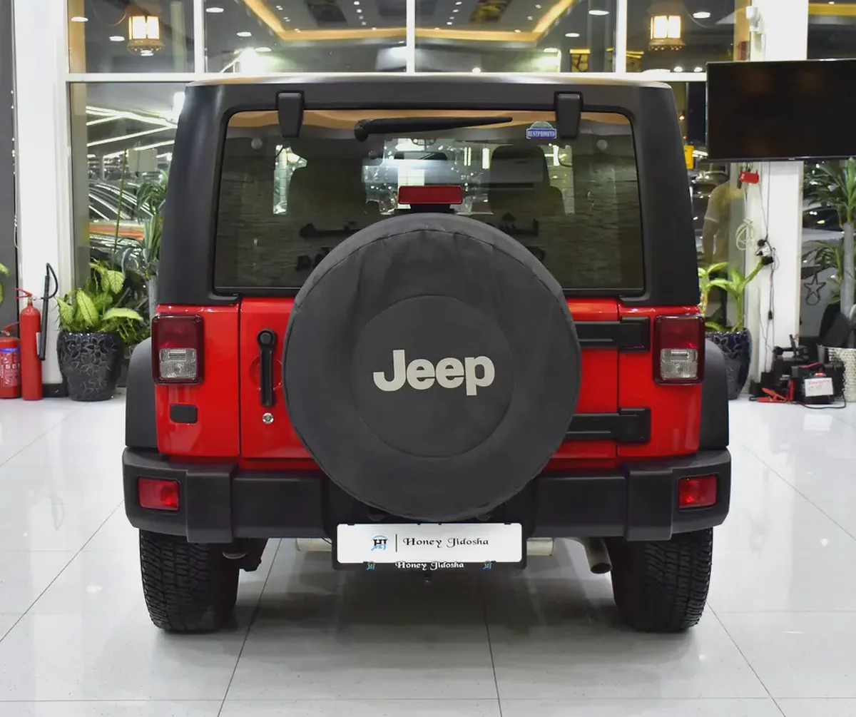 EXCELLENT DEAL for our Jeep Wrangler Sport ( 2017 Model ) in Red Color GCC Specs-4-4