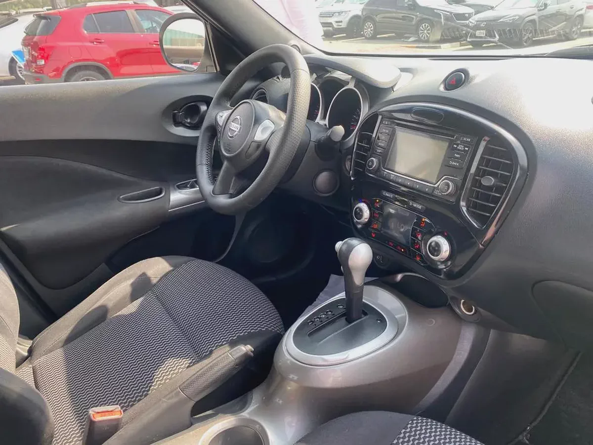 Nissan juke 2015 white color GCC calen car-7-7