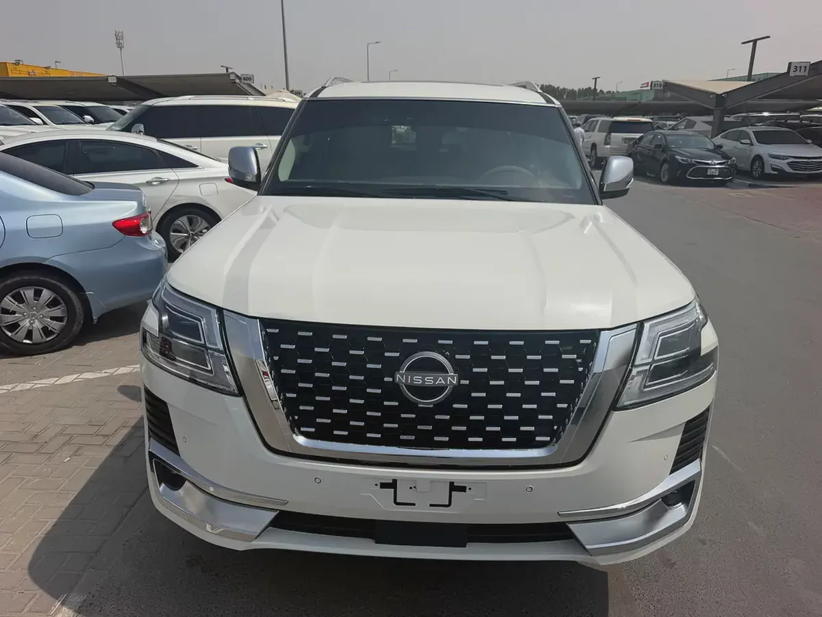 Nissan patrol 2014 fullopshin look 224 white color GCC