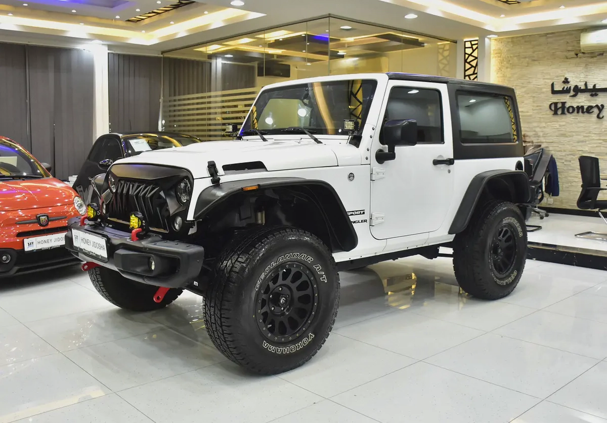 EXCELLENT DEAL for our Jeep Wrangler Sport ( 2017 Model ) in White Color GCC Specs-1-1