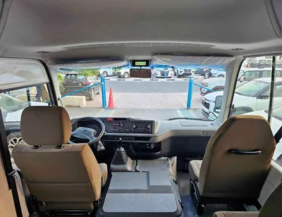 Toyota Coaster 2.7L PETROL M/T DUAL TONE || 23 SEATER | AUTO DOOR | HLF LUGGAGE RACK (CODE # COPB)-9