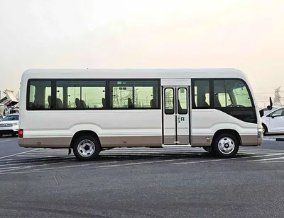 Toyota Coaster 2.7L PETROL M/T DUAL TONE || 23 SEATER | AUTO DOOR | HLF LUGGAGE RACK (CODE # COPB)-1
