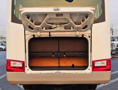 Toyota Coaster 2.7L PETROL M/T DUAL TONE || 23 SEATER | AUTO DOOR | HLF LUGGAGE RACK (CODE # COPB)-4