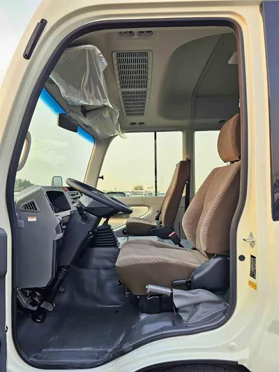 Toyota Coaster 2.7L PETROL M/T DUAL TONE || 23 SEATER | AUTO DOOR | HLF LUGGAGE RACK (CODE # COPB)-6