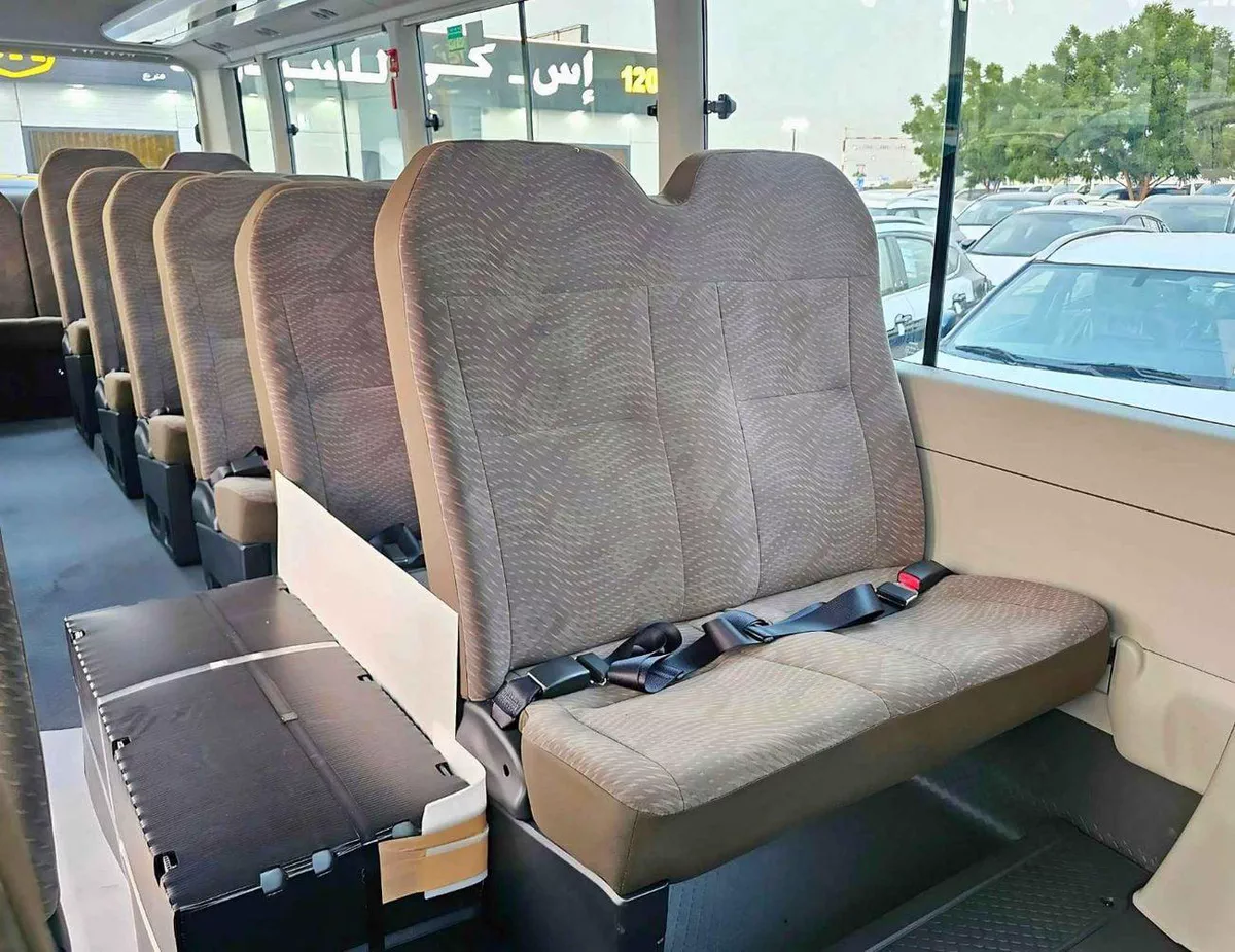 Toyota Coaster 2.7L PETROL M/T DUAL TONE || 23 SEATER | AUTO DOOR | HLF LUGGAGE RACK (CODE # COPB)-18-0