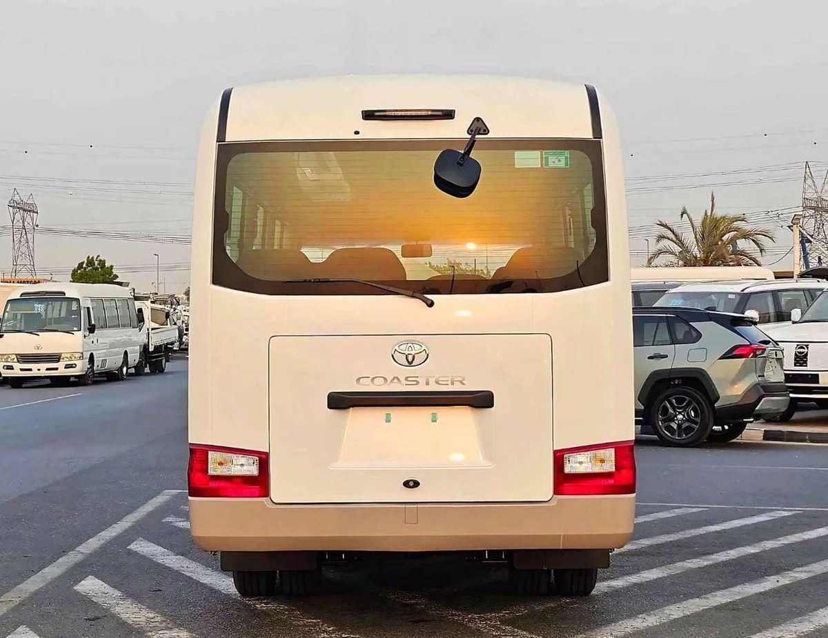 Toyota Coaster 2.7L PETROL M/T DUAL TONE || 23 SEATER | AUTO DOOR | HLF LUGGAGE RACK (CODE # COPB)-3-0