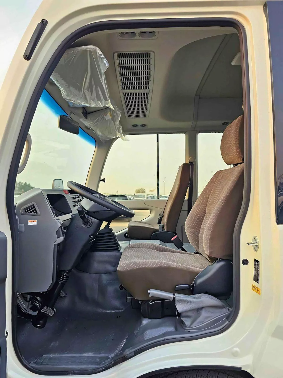 Toyota Coaster 2.7L PETROL M/T DUAL TONE || 23 SEATER | AUTO DOOR | HLF LUGGAGE RACK (CODE # COPB)-6-0