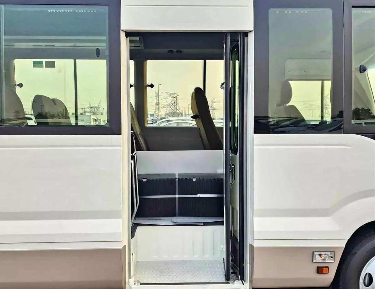 Toyota Coaster 2.7L PETROL M/T DUAL TONE || 23 SEATER | AUTO DOOR | HLF LUGGAGE RACK (CODE # COPB)-7-0