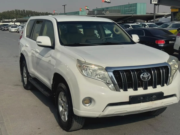 Toyota Prado 2014 white cooor GCc Caleb car
