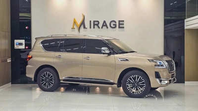 NISSAN - PATROL - LE PLATINUM - V 8 - 2022 MODEL - GCC SPECS - V 8 - 58,000KM - GOLD COLOR-0