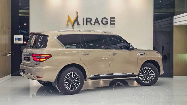 NISSAN - PATROL - LE PLATINUM - V 8 - 2022 MODEL - GCC SPECS - V 8 - 58,000KM - GOLD COLOR