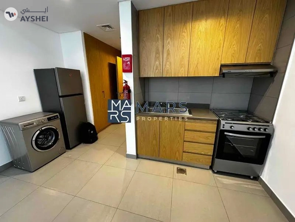 Spacious studio with kitchen appliances and all facilities available in Al mamsha.