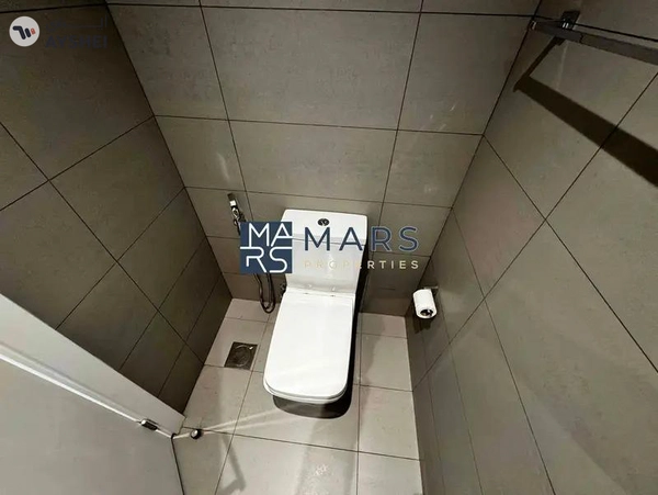Spacious studio with kitchen appliances and all facilities available in Al mamsha.