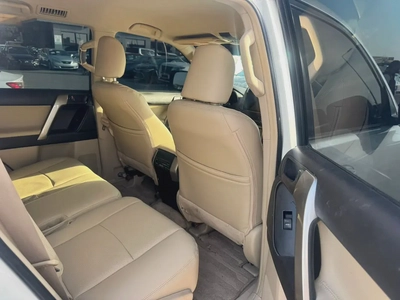 Toyota Prado 2013 white color GcC calen cR-6