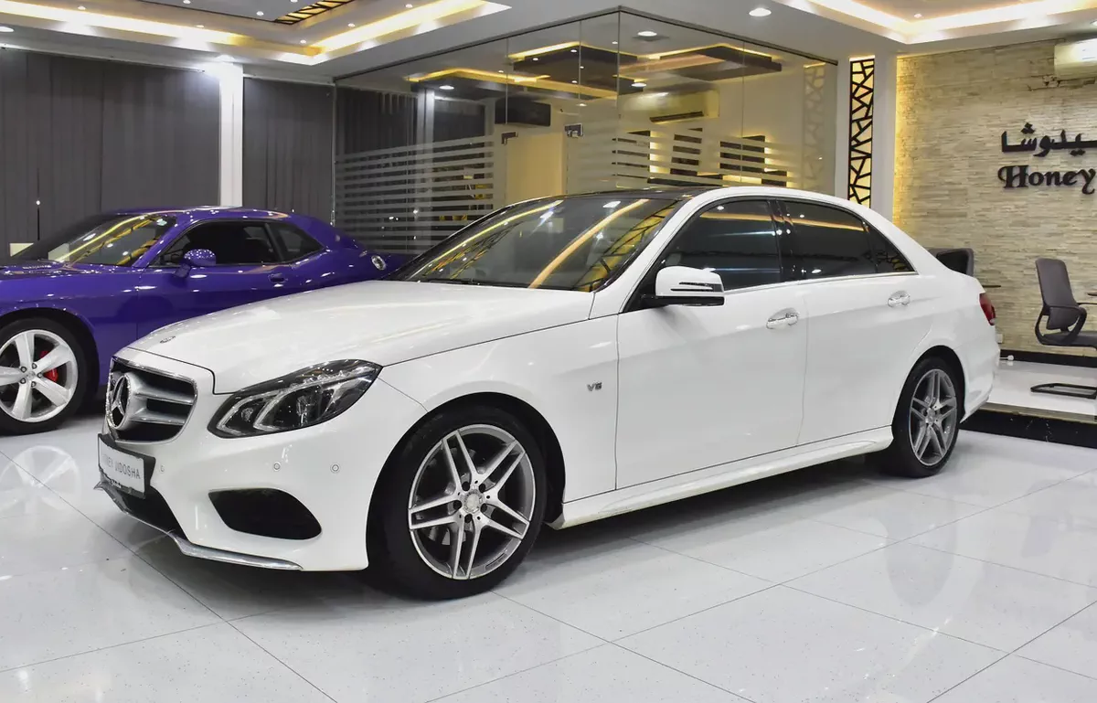 EXCELLENT DEAL for our Mercedes Benz E300 ( 2014 Model ) in White Color GCC Specs-1-1
