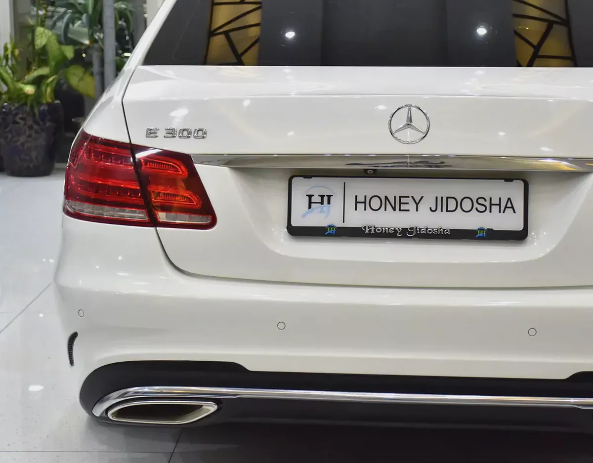 EXCELLENT DEAL for our Mercedes Benz E300 ( 2014 Model ) in White Color GCC Specs-7-7