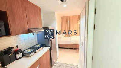 Beautifully Furnished Studio with laundry room available monthly.-9