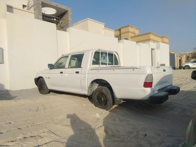 Mitsubishi L200 -7