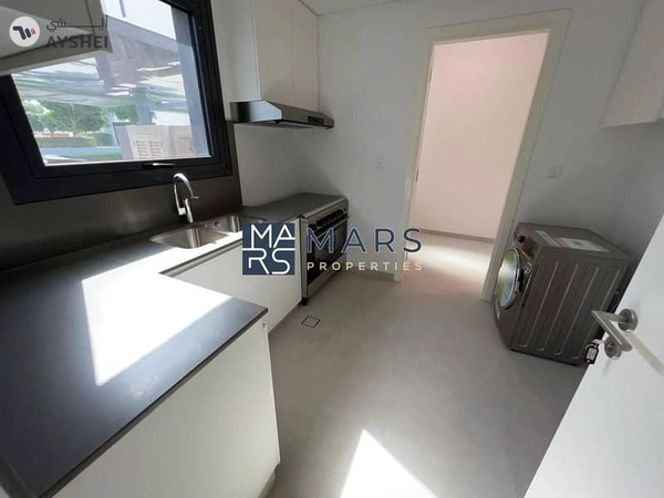 Spacious, Luxury 2 Bedroom Townhouse with Close Kitchen Available For Rent in Aljada, Sharjah.