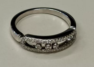 Messika Baby Move Pavé Ring crafted in 18k white gold, featuring three signature moving diamonds-3