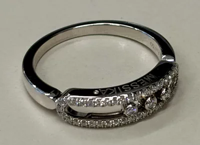 Messika Baby Move Pavé Ring crafted in 18k white gold, featuring three signature moving diamonds-1