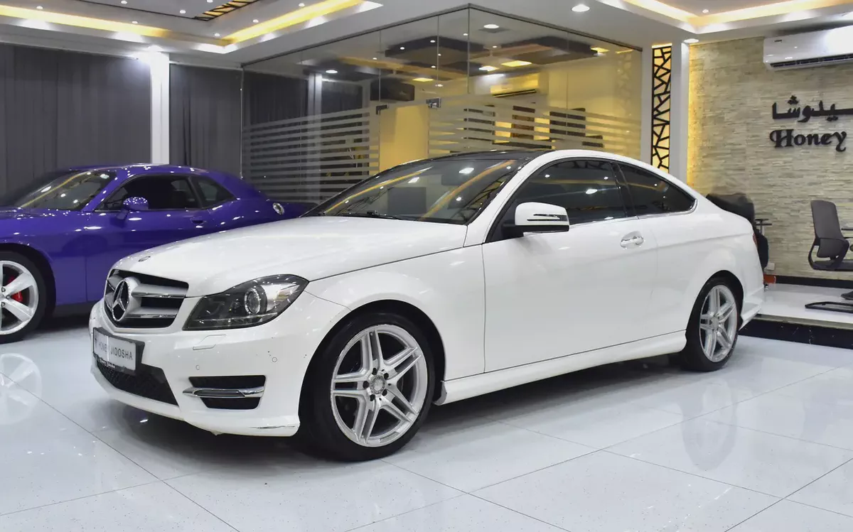EXCELLENT DEAL for our Mercedes Benz C250 Coupe ( 2015 Model ) in White Color GCC Specs-1-1