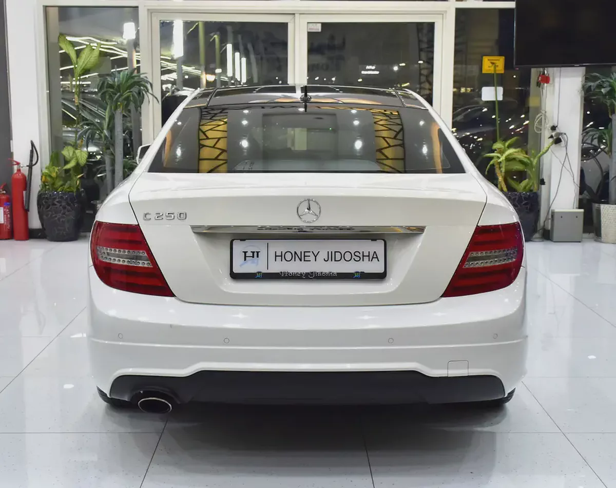 EXCELLENT DEAL for our Mercedes Benz C250 Coupe ( 2015 Model ) in White Color GCC Specs-4-4