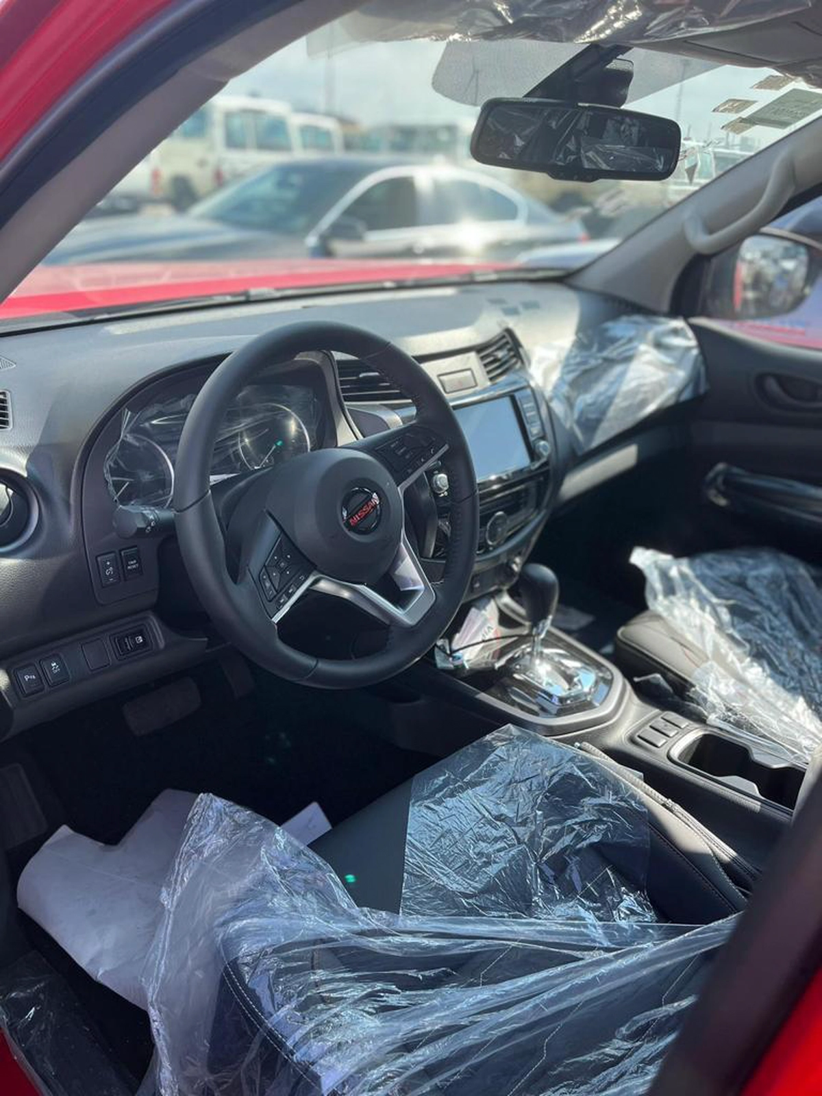 Nissan Navara – Red Exterior with Black Interior Pickup-4-4