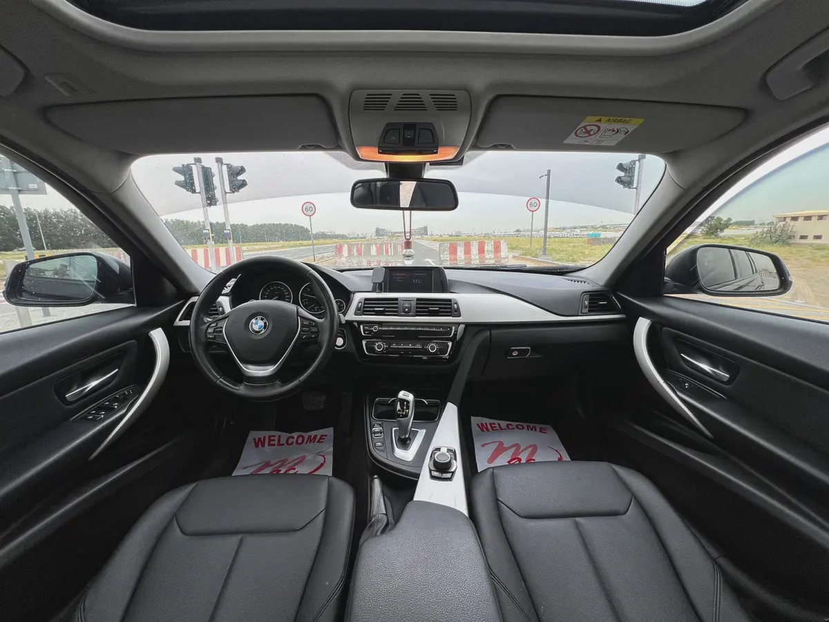 BMW 3-Series 318ci 2018 GCC Specs - Excellent Condition-18-18