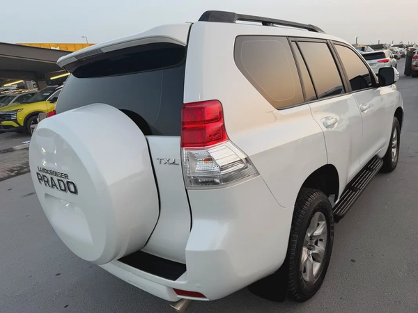 Toyota Prada 2013 white cooor GCc calen car