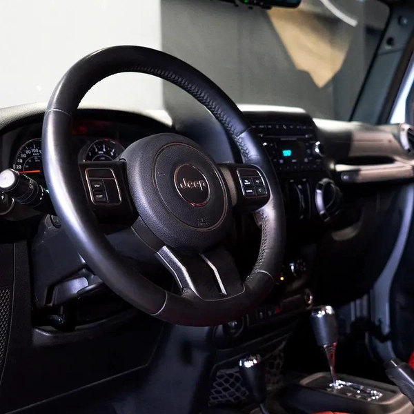 AED 1,966 p.m • 0% Downpayment • Jeep Wrangler Unlimited Sport • 1 Year Warranty