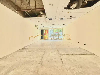 Bright Retail Shop with Covered Parking | Trafalgar Executive, International City-0