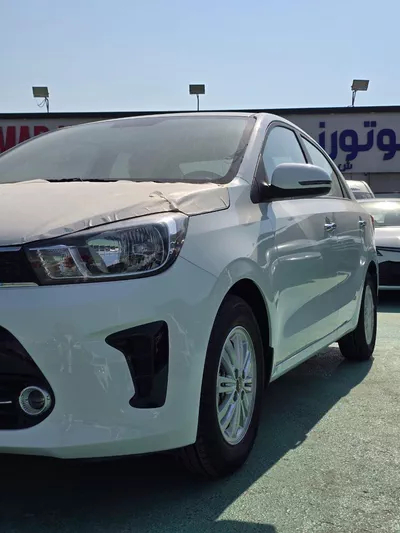 KIA PEGAS WHITE PETROL-8