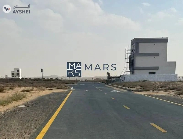 Land in Rawdat Al Qurt on a main road and alley – Prime Location