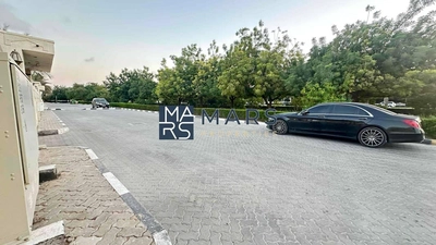 Perfectly located on Main Street residential plot 16000 sqft for sale in Al khazamia-0