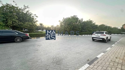 Perfectly located on Main Street residential plot 16000 sqft for sale in Al khazamia-1