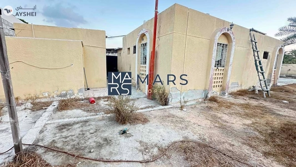 Perfectly located on Main Street residential plot 16000 sqft for sale in Al khazamia
