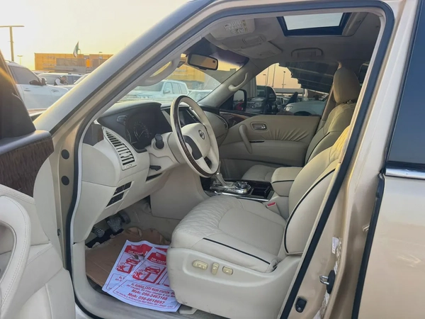 Nissan patrol 2011 fullopshin gold color GCc calen car