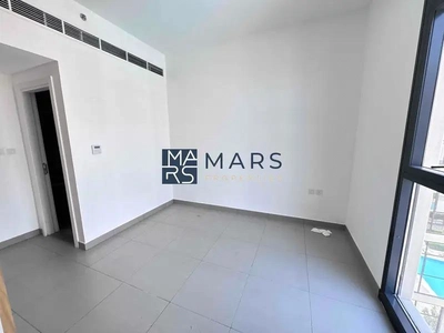 Spacious one bedroom with kitchen appliances in modern community-10